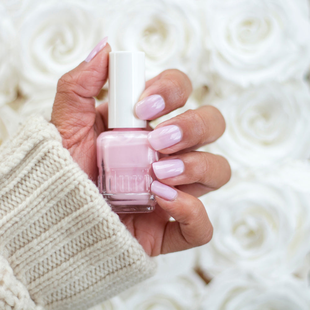 309 Iced Roses by duri cosmetics. Light pink semi-sheer coverage. perfect french manicure shade. Girly girl nails. Classic light pink manicure. Best selling pink nail polish color.