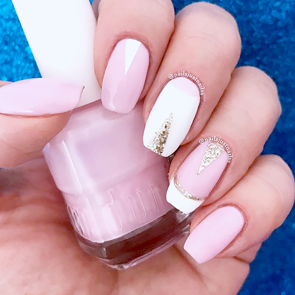 @nailsjustnailss nail art using 309 Iced Roses by duri cosmetics. Pink and white manicure.